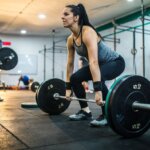 Botox near me Redondo Beach, CA Woman exercising with barbell